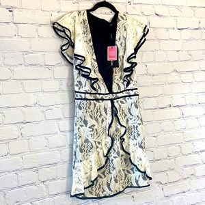 Pretty Little Things Plunging V Black & White Lace & ruffle mini dress